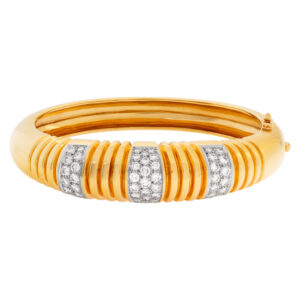 Elegant 18k bangle with over 2.5 cts in pave set diamonds