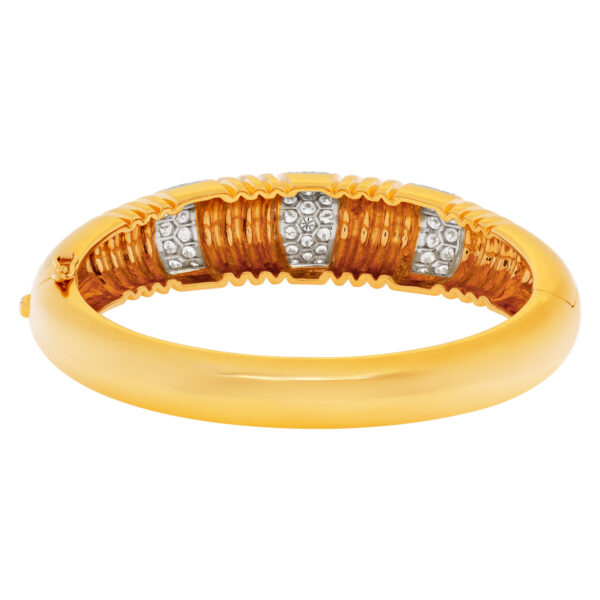 Elegant 18k bangle with over 2.5 cts in pave set diamonds