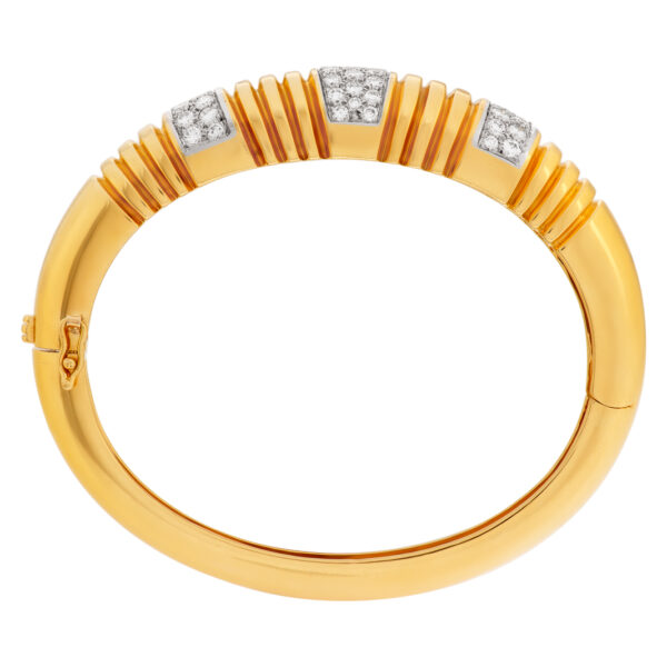 Elegant 18k bangle with over 2.5 cts in pave set diamonds