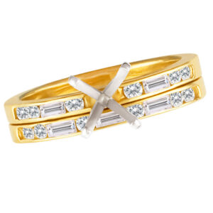 Engagement Setting in 18k yellow gold. 1.00cts in round and baguettes diamonds