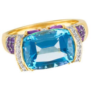 Colorful and fun ring in 14k gold with deep blue topaz, amethyst and diamond accents