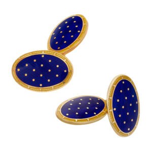 Oval cufflinks in 18k accented with gold polka-dotted blue enamel