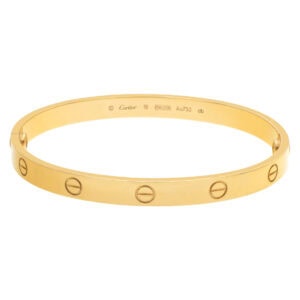 Cartier Love bracelet in 18k yellow gold-  Complete with Cartier Box , COA & Screwdriver. Size 19.