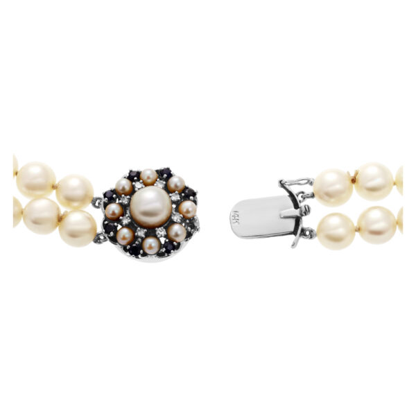 Double row 7 x 7.5mm cultured pearl necklace with 14k white gold diamond, sapphire and pearl clasp