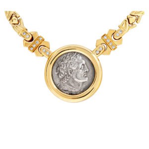 18k necklace with ancient coin and diamond accents.