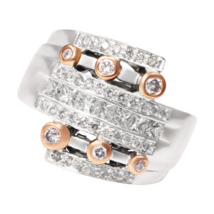 Round & princess- cut diamond ring in 14k white & rose gold.