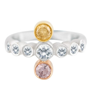 White, cognac & light pink diamond cross ring in 18k; SI clarity.