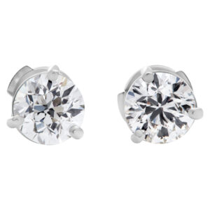 GIA certified diamond studs 1 carat (J color, VVS clarity) and 1.01 carat (J color, VVS2 clarity) set in 18k white gold martini settings