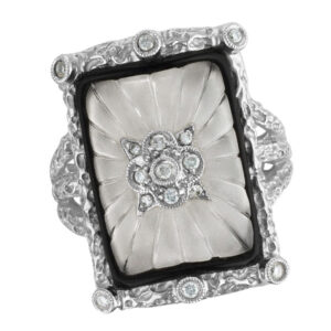 Unique design ring in 14k white gold with center crystal surrounded by black enamel and over 0.15cts