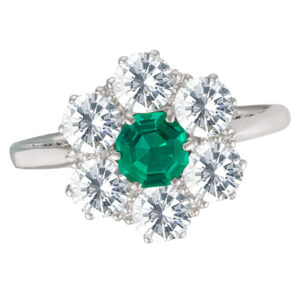 Flower diamond with center emerald ring