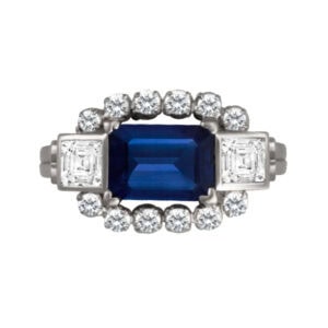 Gorgeous blue sapphire & diamond ring set in 18k white gold with app. 0.50 carats in emerald-cut & r