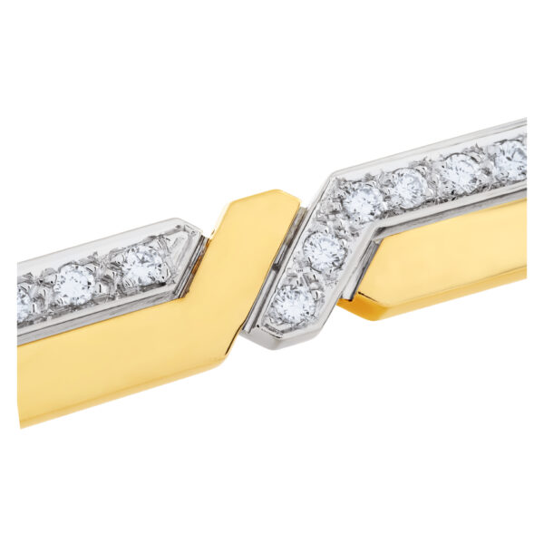 Pomelatto lightning bolt pin in 18k white & yellow gold with app 0.75 cts in diamonds