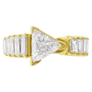 GIA Certified modified triangular brillian cut diamond 1.03 ct (H color, I1 clarity) ring set in 14k yellow gold.