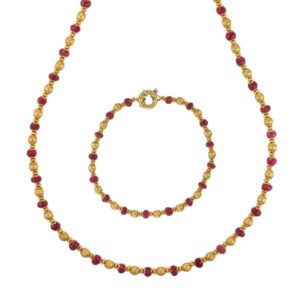 18k yellow gold and ruby beaded necklace and bracelet