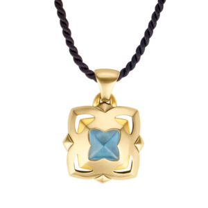 Bvlgari blue topaz pendant in 18k on black silk cord