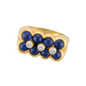 Dainty cabochon sapphire flowers with diamond center ring in 18k yellow gold