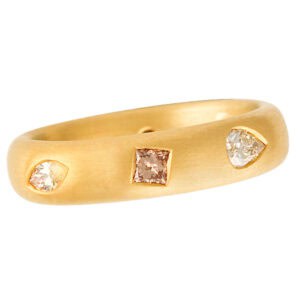 Michael Weggenman fancy diamond band in 22k gold with app. 0.70 cts in natural fancy diamonds.