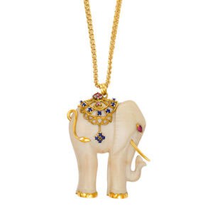 Elephant pendant in 14k adorned with sapphires and ruby.