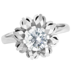 Vintage Darling 18k white gold. setting- with approx. 0.68 carat full cut round brilliant diamond center