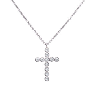 Small Tiffany & Co diamond cross pendant and chain in platinum