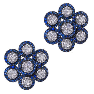 Flower style earrings in 18k white gold, diamonds, and sapphire.