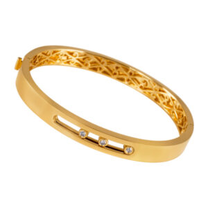 Bangle in 18k yellow gold with diamonds