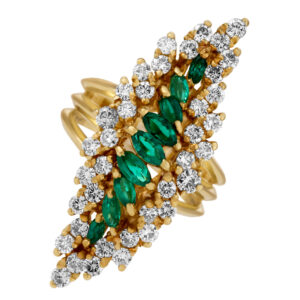 Emerald and diamond ring in 14k.