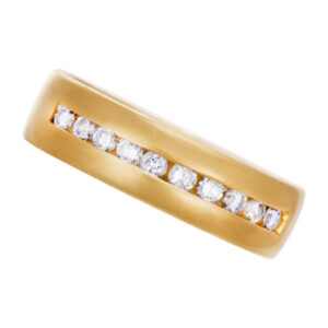 Semi Diamond Eternity Band and Ring in 14k yellow gold. 0.50 carats in channel set diamonds. Size 10.5