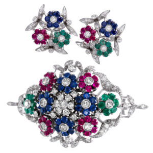 Sapphire, emerald, ruby & diamond  set in 18k white gold