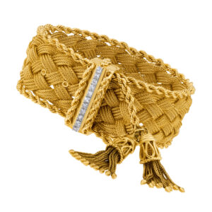 Braided woven bracelet in 14k with diamond bar across clasp & tassle accents. Circa 1950's.