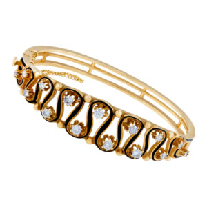 Unique Bangle in 14k yellow gold w/ 15 clean diamonds. 1.00 carats in diamonds.