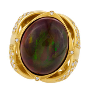 Australian black opal ring in 18k yellow gold with diamonds. 1.00 ct in diamonds. Size 6.