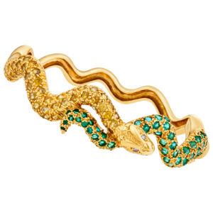 Sazingg serpent swirl bangle app. 3.5 in yellow sapphires and emeralds in 18k