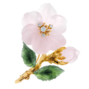 Crystal and jade flower brooch in 14k yellow gold with diamond accents.