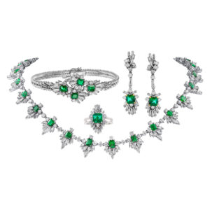 Emerald and diamond ring, earrings and necklace and bracelet in 18K white gold