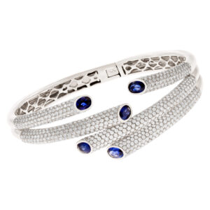 Diamond bangle with sapphire endcaps