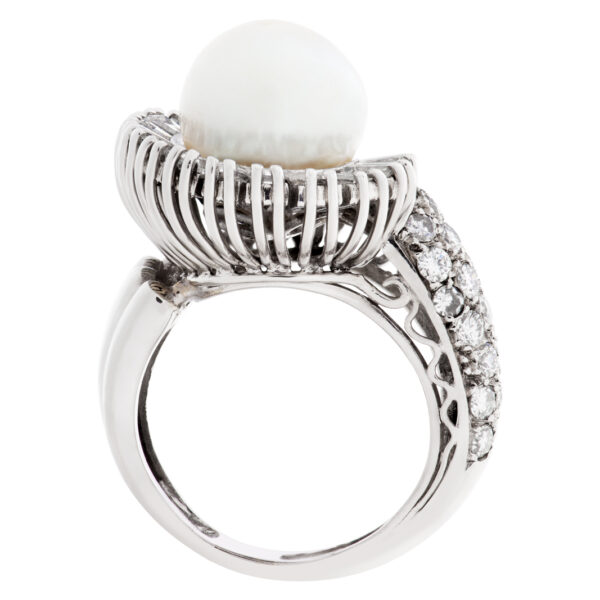 Silver pearl ring set in platinum. 2.00 carats in round and baguette diamonds