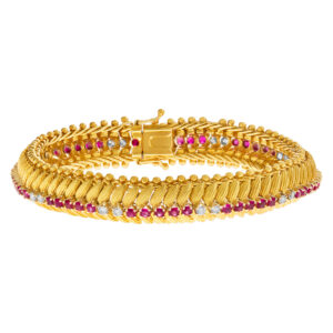 Serpentine bracelet in 18k with diamonds and rubies