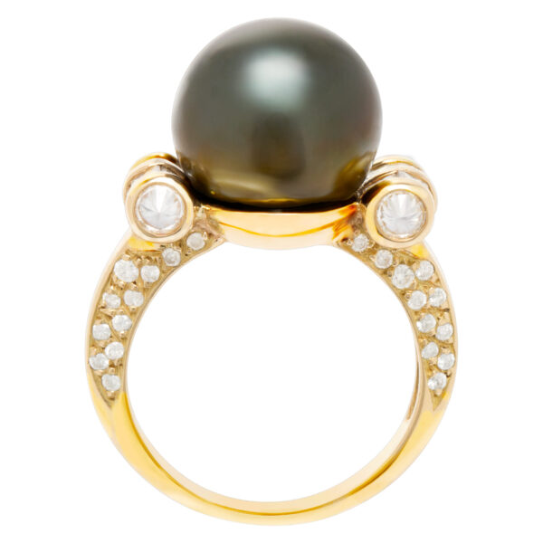 South Sea Pearl ring with diamond accents in 18k. 12.2 mm Pearl. 1.60 carats