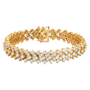 Ladies bracelet in 18k yellow gold with approx 12 carats in diamonds