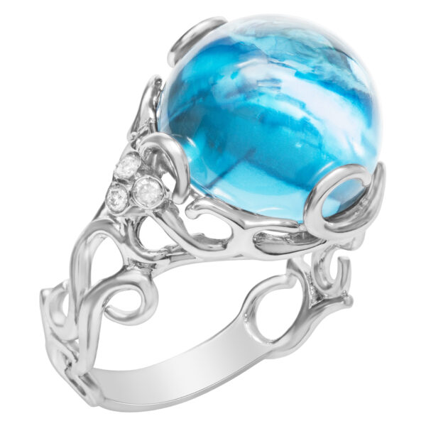 Funky Blue topaz ring in 18k white gold with diamond accents. Size 7.25.