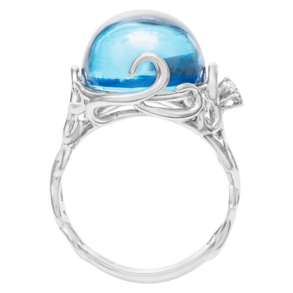 Funky Blue topaz ring in 18k white gold with diamond accents. Size 7.25.