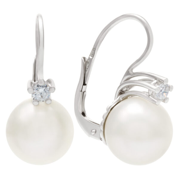 South Sea pearl with diamond accent earrings in 18k white gold. 0.24cts in diamonds.