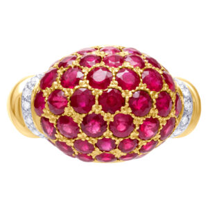 Ruby ring with diamond accents in 18k yellow gold