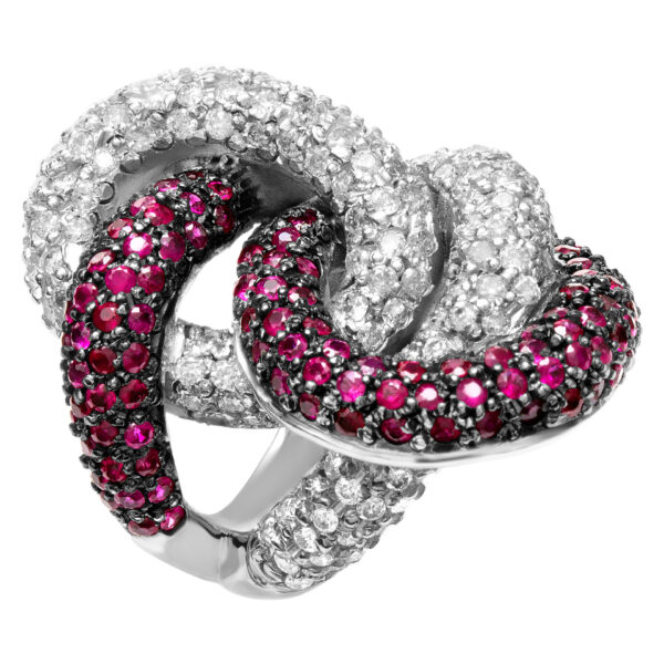 Diamond and ruby swirl ring in 18k white gold. 2.02 cts in rubies, 1.10cts in diamonds