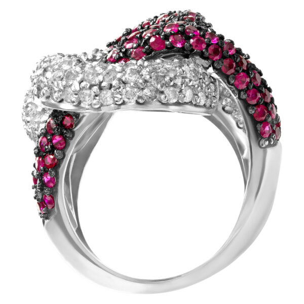 Diamond and ruby swirl ring in 18k white gold. 2.02 cts in rubies, 1.10cts in diamonds