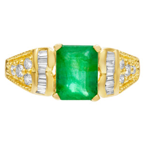 Emerald and diamonds set in 18k gold ring. 1.35cts in emeralds, 0.28cts in diamonds