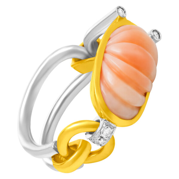 Light pink coral ring with diamond and sapphire accents in 18k yellow & white gold