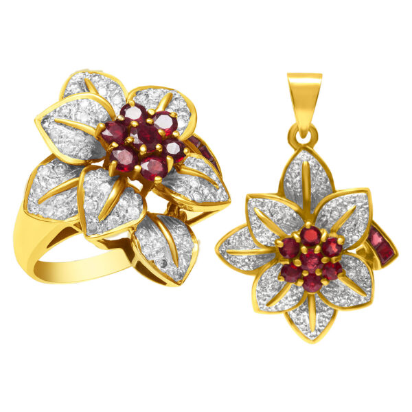 Ruby and diamond flower pendant and ring set in 18k. 1.00 carats in diamonds