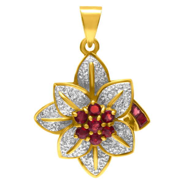 Ruby and diamond flower pendant and ring set in 18k. 1.00 carats in diamonds